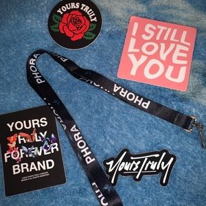 Phora’s blue butterfly lanyard and sticker
